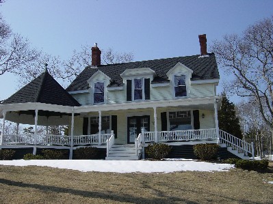 Henry and Jessica's waterfront home. (front/before)